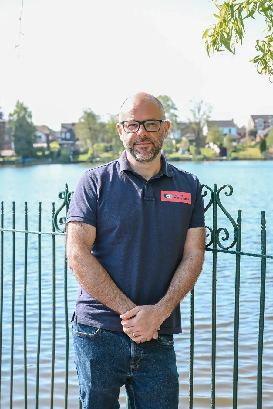 Rob Davies of Lynton Mortgages beside Alsager Mere